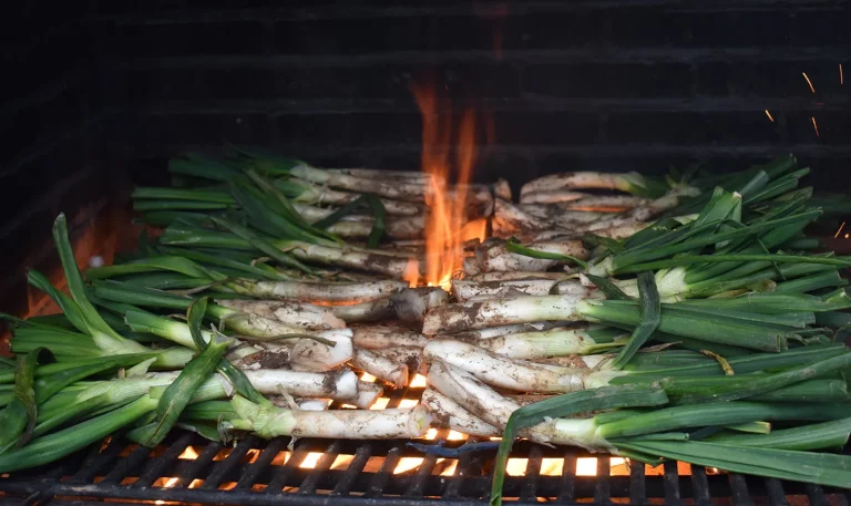 Calçots and fire at Masia Fontscaldes restaurant.